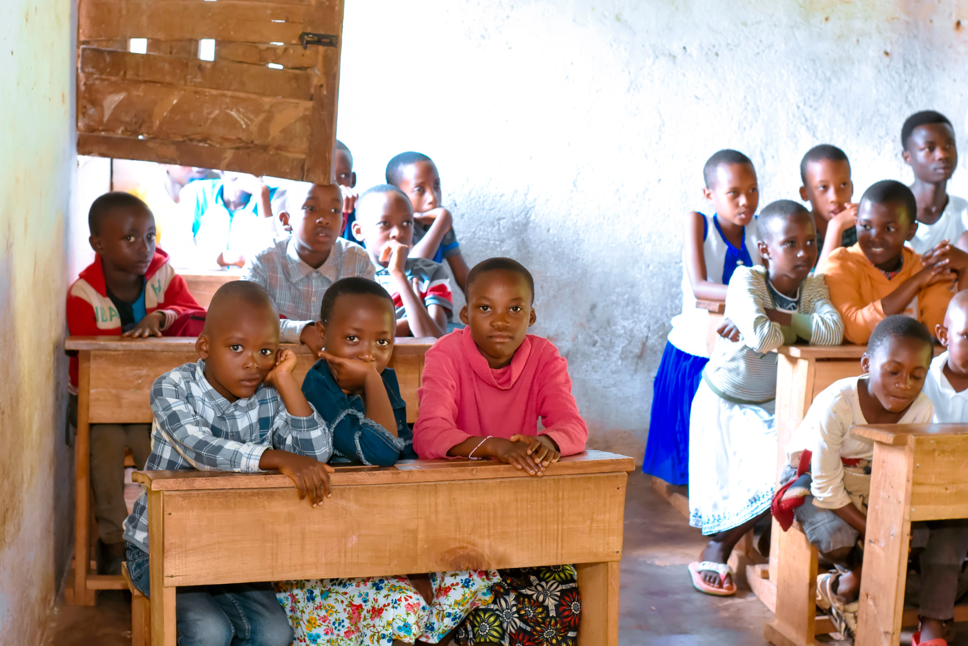 Pupils at their desks during a school visit in Burundi.